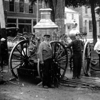 Newton Firemen Hosing Monument in Town Square in 1913
